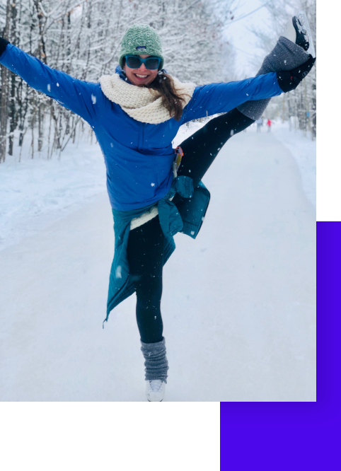 Me figure skating outside in the snow.